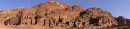 Royal Tombs Panorama * The Royal Tombs are set into the rock-face of the Jabal Al-Khubtha. These tombs, thought to be those of several Nabataean kings, are certainly amongst the most impressive of the 500 tombs to be found in Petra. The large tomb at the far left is that of Sextus Florentinus. The tomb was constructed in 130 AD, is one of the few tombs which can be accurately dated. Over the doorway a Latin inscription informs us it was constructed for Sextus, Roman Governor of the Province of Arabia by his son. * 1080 x 248 * (119KB)